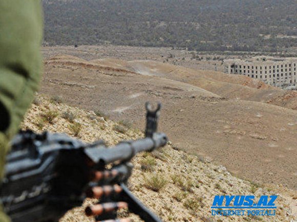 Silahlılar Suriyanın Həma və Latakiya vilayətlərini atəşə tutub