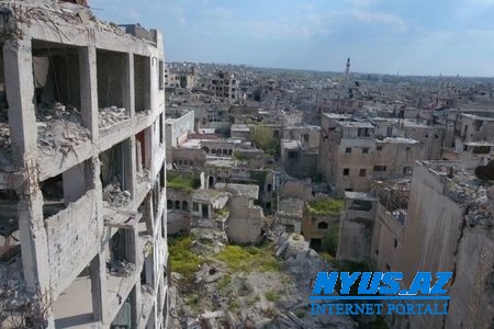 Suriyada inzibati bina atəşə tutulub, 9 nəfər yaralanıb