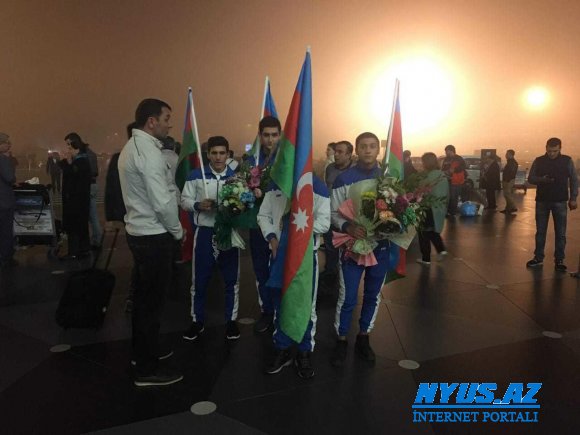 Olimpiadada iştirak etmiş Azərbaycan idmançıları Bakıya qayıdıblar - FOTO